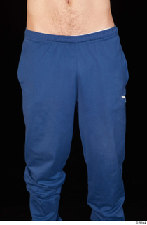 Hamza blue jogging pants dressed thigh 0001.jpg